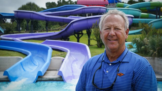 Mark Lazarus, the president and owner of Lazarus Entertainment Group, poses for a picture, Thursday, July 9, 2020, in Myrtle Beach, S.C. Businesses in beach communities and mountain getaways up and down the East Coast are fretting about a shortage of workers as the summer season picks up steam. The concern comes after the Trump administration announced in June that it was extending a ban on green cards and adding many temporary visas to the freeze, including J-1 cultural exchange visas and H-2B visas.