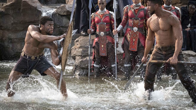 Family Movie Night with "Black Panther" at 7 p.m. Oct. 31 at Connors Temple Baptist Church, parking lot at 510 W. Gwinnett St. Shown - Chadwick Boseman, left, and Michael B. Jordan star as T'Challa and Erik Killmonger, respectively, in "Black Panther."