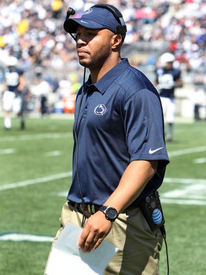 Apr 12, 2014; State College, PA, USA; Penn State Nittany Lions offensive recruiting coordinator/wide receivers coach Josh Gattis walks off the field in the second quarter of the Blue White spring game at Beaver Stadium. The Blue team defeated the White team 37-0. Mandatory Credit: Matthew O'Haren-USA TODAY Sports