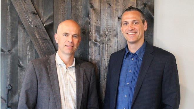 Nathan Schock, left, and Nathan Unruh are two of the three operating board members of FiveFour.