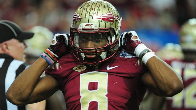 Jalen Ramsey of the Florida State Seminoles heads off the field against the Houston Cougars during the Chick-Fil-A Peach Bowl at the Georgia Dome on December 31, 2015 in Atlanta, Georgia.