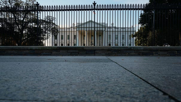 Early morning light lands on the North Portico of...
