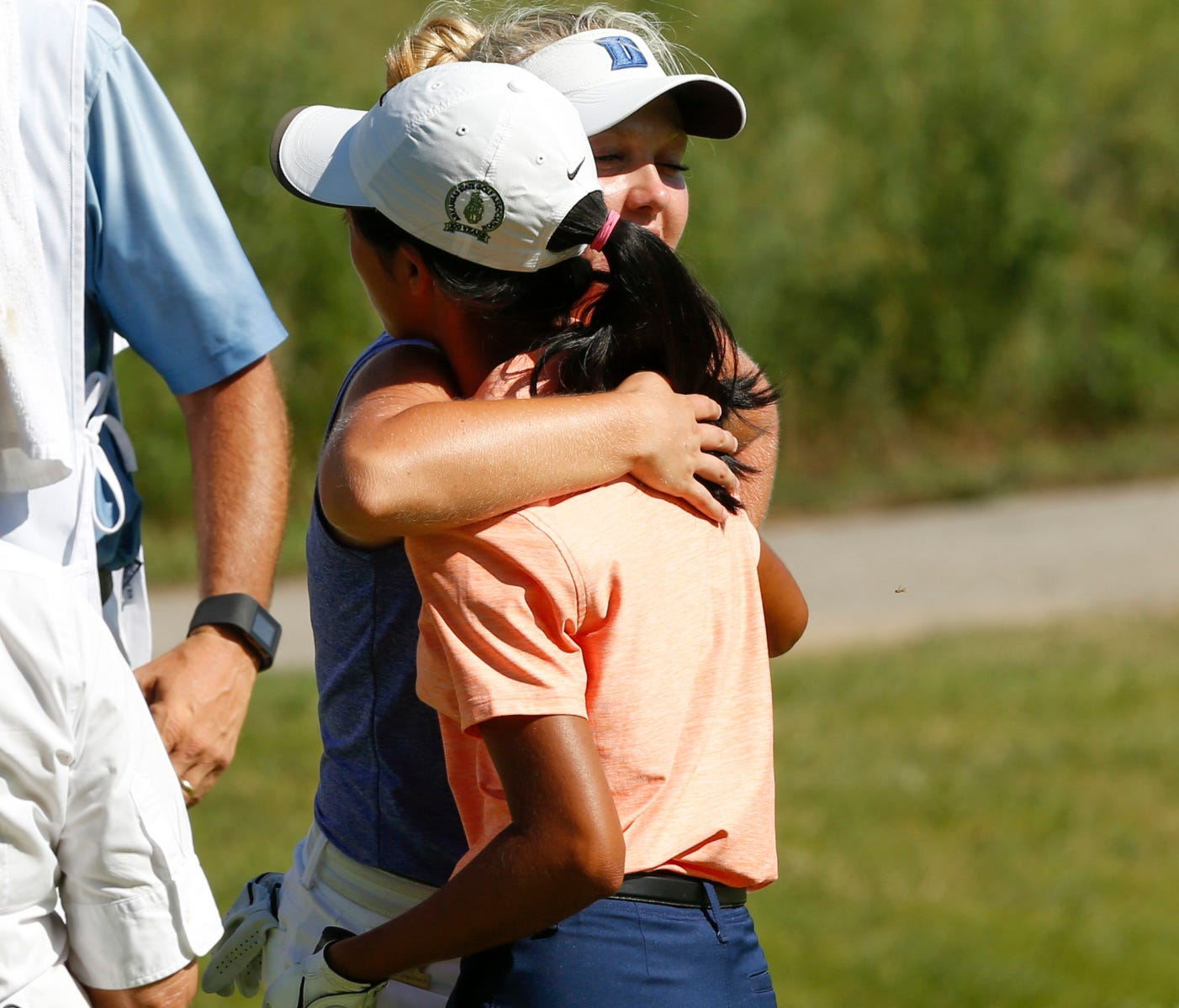 Elizabeth Moon and Erica Shepherd share a hug after Shepherd won the match on the first playoff hole during the semifinal round of match play at the 2017 U.S. Girls' Junior at Boone Valley Golf Club in Augusta, Mo. on Friday, July 28, 2017.  (Copyrig
