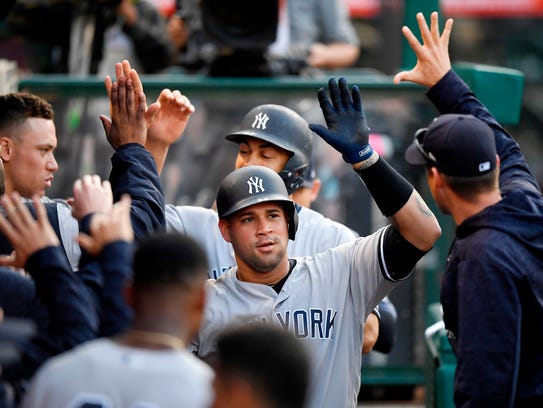 New York Yankees' Gary Sanchez is congratulated by