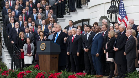 President Trump and GOP lawmakers celebrate passage
