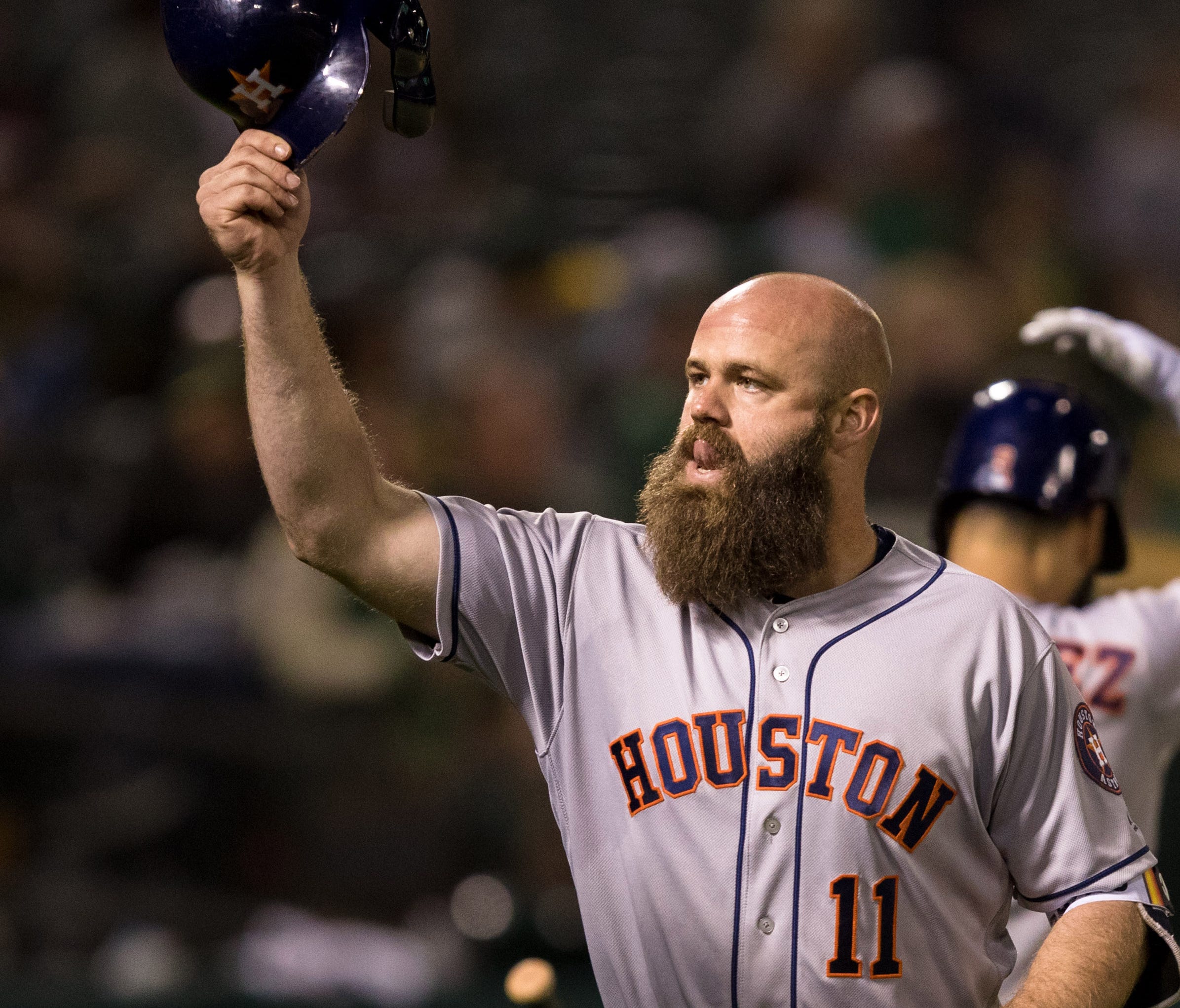 Evan Gattis reacts after hitting a solo home run.