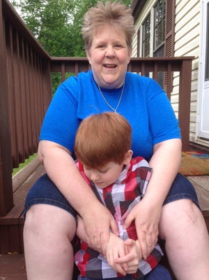 Lisa Smith of Van Buren Township, whose son Noah, 6, is autistic, asked the state to add autism to the conditions that qualify for medicinal pot.
