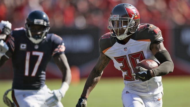 In this Nov. 13, 2016, file photo, Tampa Bay Buccaneers free safety Bradley McDougald (30) runs after picking up a fumble by the Chicago Bears during an NFL football game in Tampa, Fla.