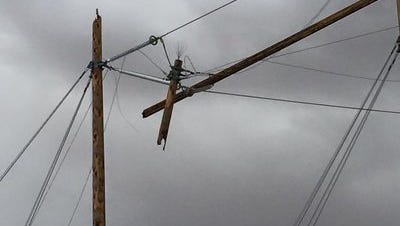 Sunday's power outage was caused by a broken power pole that caught fire during stormy conditions.
