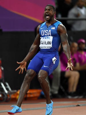 Justin Gatlin of the United States wins the 100, beating Usain Bolt.