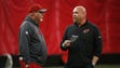 Arizona Cardinals head coach Bruce Arians talks to