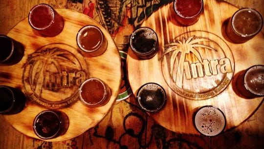Choose a flight instead of a pint at Intracoastal Brewing Company and try several of their creative craft beers at a time.