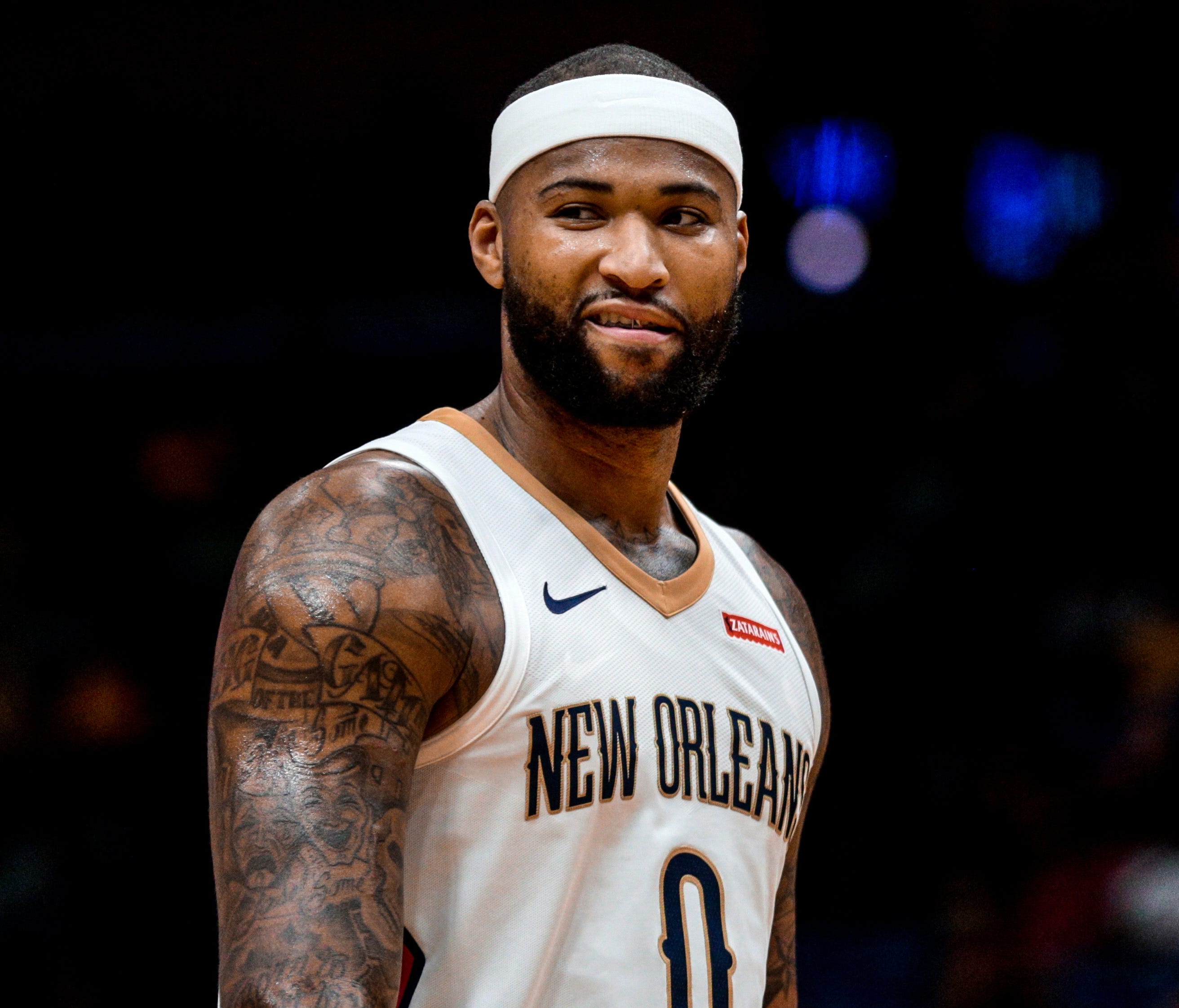 New Orleans Pelicans center DeMarcus Cousins looks on against the Detroit Pistons during the first quarter at the Smoothie King Center.