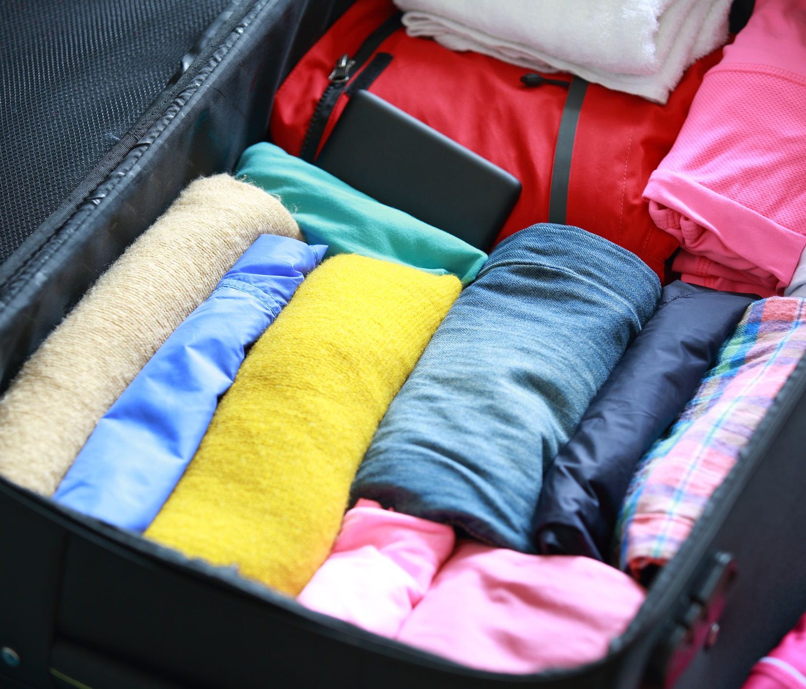 Rolling instead of folding clothes doesn't just save space, it can prevent wrinkles.