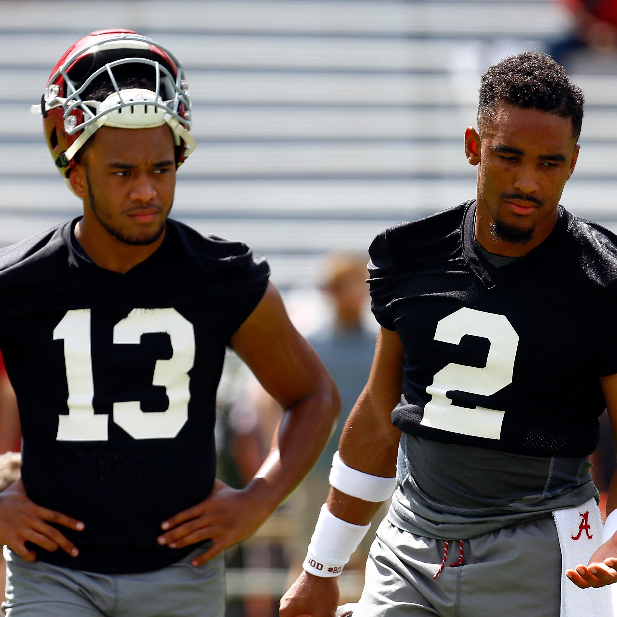 Alabama quarterback Tua Tagovailoa stands next to Jalen Hurts (2) during the team's practice this month.