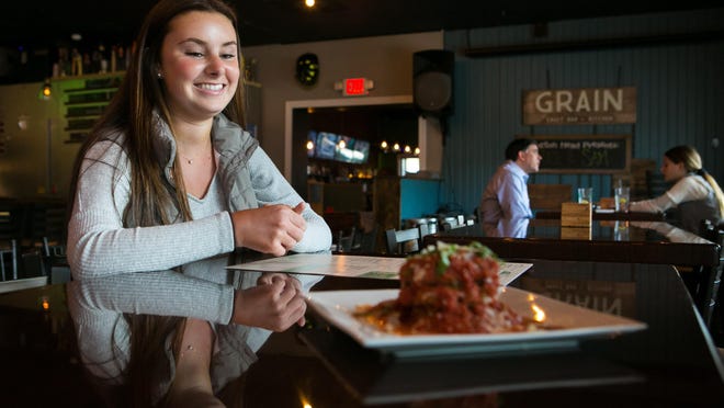 UD student Taylor Austin with the HRM program created a new menu item for Newark restaurant, Grain Craft Bar + Kitchen: The Tower of Power. The dish is a stack of panko crusted fried green tomatoes, bleu cheese and jumbo lump crab served with a spicy marinara sauce and a basil garnish.