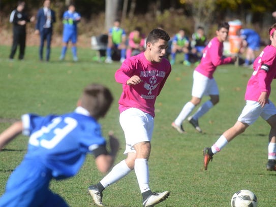 Carlo Gonzalez and the Pompton Lakes boys' soccer team