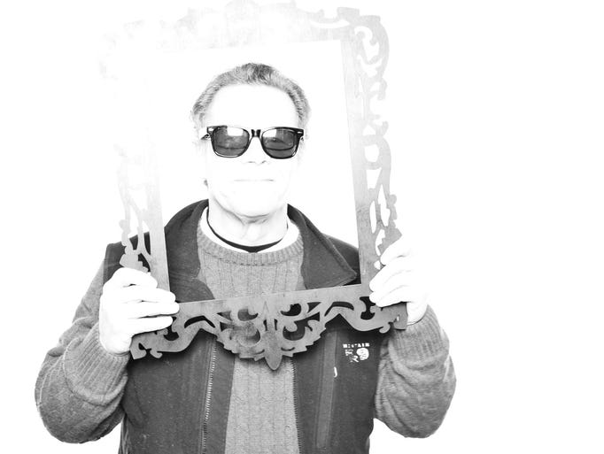 Guests pose in the MINT photobooth Feb. 28 at The Yorktowne