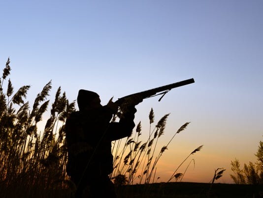 hunter-shooting-at-prey_large.jpg