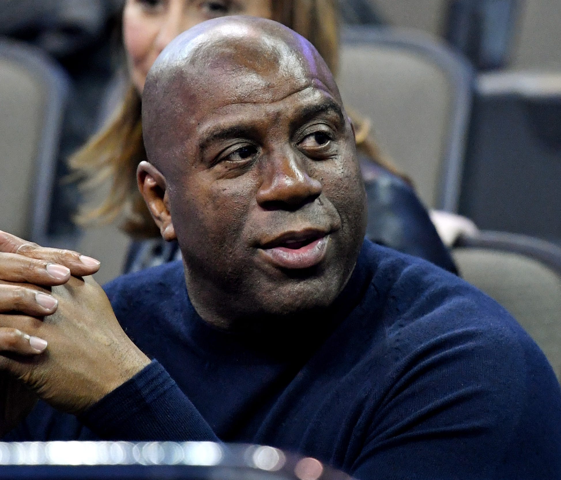 Magic Johnson watches during the first half between the Clemson Tigers and the Kansas Jayhawks in the semifinals of the Midwest regional of the 2018 NCAA Tournament.