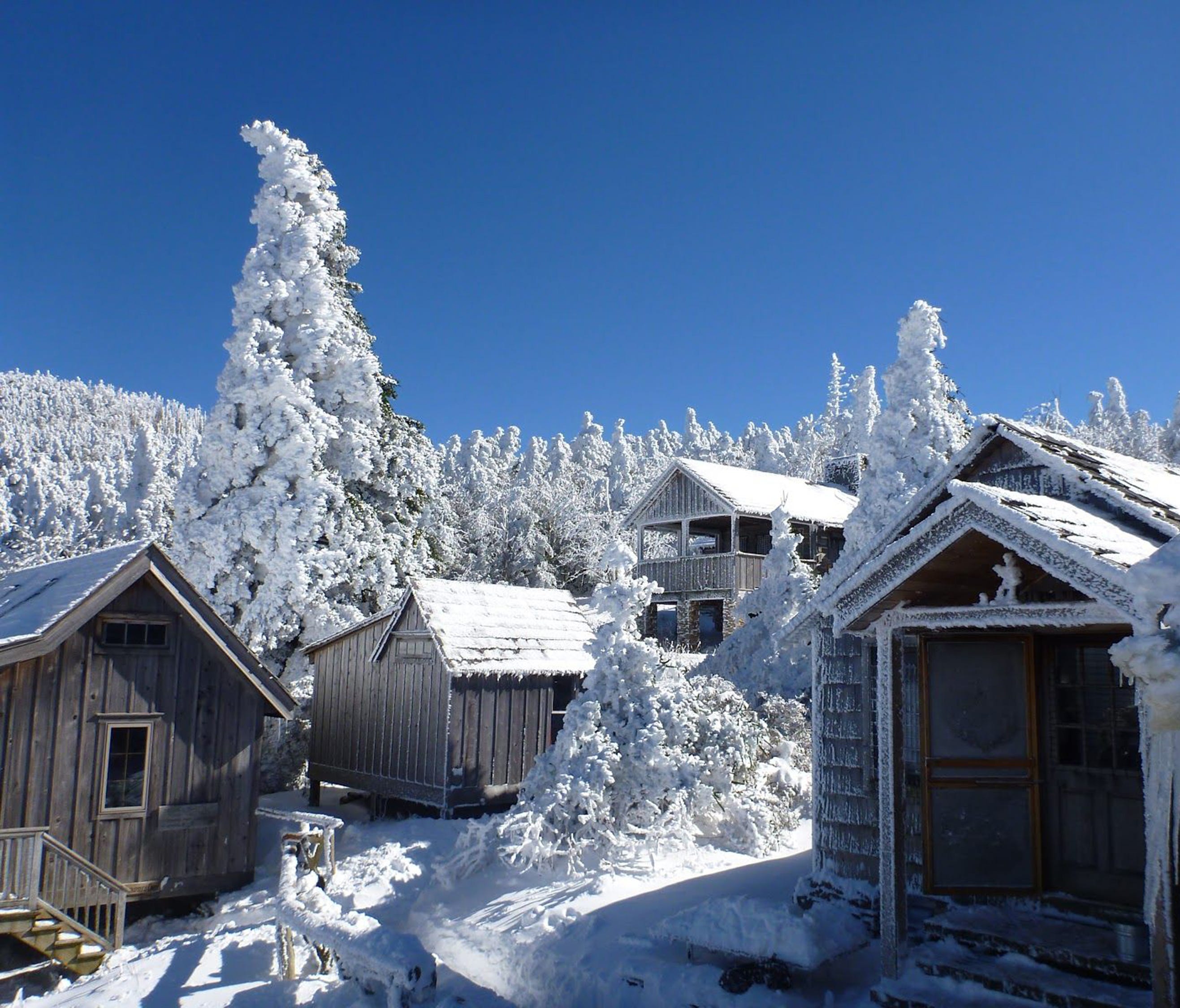Snow blankets much of LeConte Lodge and its surrounding cabins on Mount LeConte in 2012 in the Great Smoky Mountains National Park near Gatlinburg, Tenn.