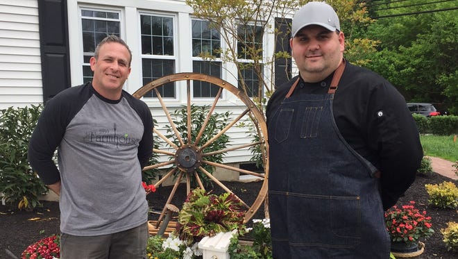 Stu Wanicur (left), sporting a Farmhouse shirt, and Executive Chef David Murray stand outside the new restaurant, which will open after Mother's Day at the former La Campagne site. Wanicur had his eye on the site for years, and has long wanted to open his own farm-to-fork restaurant.