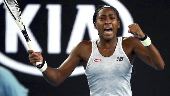 United States' Cori "Coco" Gauff reacts during her first round singles match against compatriot Venus Williams at the Australian Open tennis championship in Melbourne, Australia, Monday, Jan. 20, 2020.