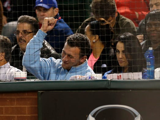 April 15, 2014: Johnny Manziel sits front row to watch