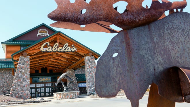 Outdoor gear giants Bass Pro and Cabela's will combine in a $4.5 billion deal announced Monday, Oct. 3, 2016.