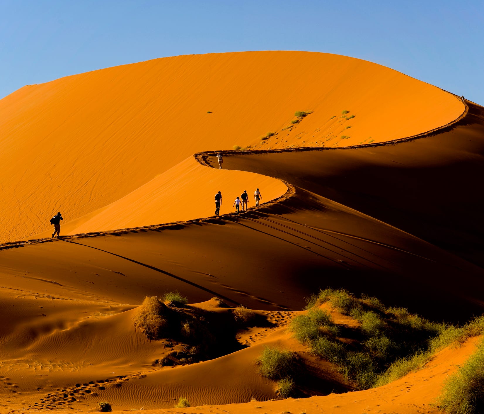 Namibia: In Namibia, you can climb some of the highest sand dunes in the world (or better yet, take a hot-air balloon ride over them). The scenery is dramatic and vaults Namibia into the discussion for one of the best places to go in Africa. 