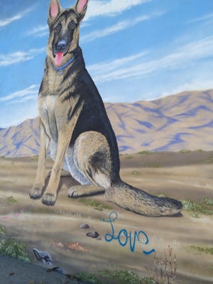 Vandals tagged the mural on the side of the Desert Hot Springs Animal Hospital over the weekend.