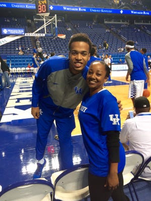 Fabiola Moreau, whose family is from Haiti, got UK freshman Skal Labissiere's attention before the Ole Miss game by encouraging him in his native Haitian Creole.