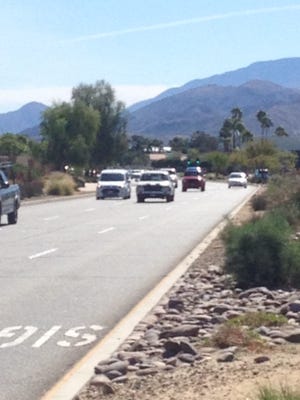 Traffic flows along Gene Autry Trail in Palm Springs.