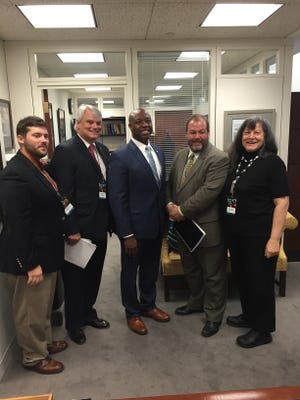 Musical Innovations owner Tracy Leenman and Fox Music House co-owner Joseph Fox met with Sen. Tim Scott, center, at this year's  NAMM Fly-In to Washington D.C.
