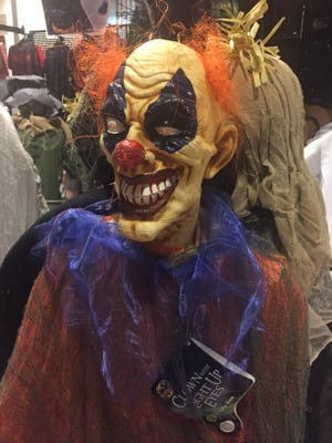 A clown costume for sale at Spirit Halloween at Twelve Oaks mall. Police are receiving calls of suspicious people in costumes.