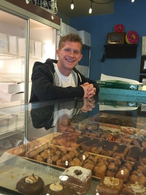 Tristin Meholick and his mother, Carmen Meholick, are the owners of Marcella's Doughnuts & Bakery in Amelia.