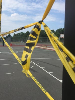 The city closed a basketball court at Pagliughi Park on Magnolia Road due damage. Police are looking for the suspects who marred the court surface by driving across it with a vehicle.