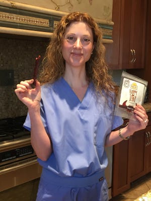 Sycamore Township Dr. Rachel Pauls shows off the newest addition to her IBS friendly snack food line - beef jerky.
