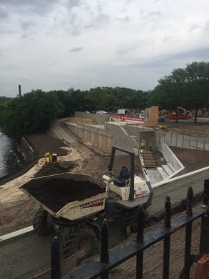 Construction work continues at the Great Falls National Park's Overlook area. The contractor unexpectedly found concrete slabs beneath the parking lot that need to be removed, city officials said.