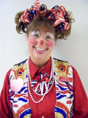 Kathy Keaton as Piccolo the Clown.