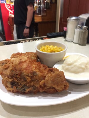 A plate of fried chicken with all of the fixings at the Tick Tock Tavern. Restaurant owner Jason Conley said he is looks to put the comfort food as a main staple on the Tick Tock Tavern's dinner menu.