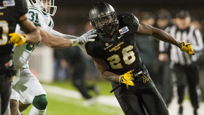 Appalachian State defensive back Josh Thomas (26)  defends on a kickoff against Ohio in the Raycom Media Camellia Bowl held at Cramton Bowl stadium in Montgomery, Ala. on Saturday December 19, 2015. (Mickey Welsh / Montgomery Advertiser)