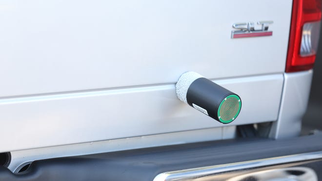 The mobile GPS tracker sticks on a suspect's vehicle.