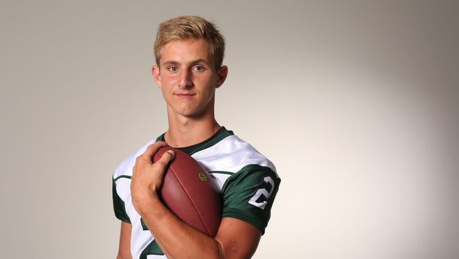 Jack Guida, quarterback at Brewster High School, photographed Aug. 24, 2016. 