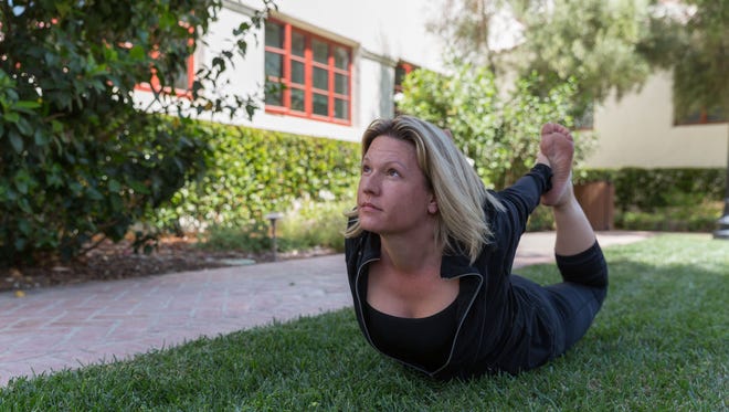 Erika Beck practices yoga on campus at CSU Channel Islands.