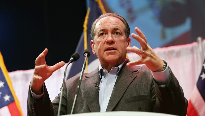 Former Arkansas Gov. Mike Huckabee speaks during the Iowa Faith & Freedom Coalition 2015 Spring Kickoff on April 25 in Waukee. In an Iowa Poll of likely GOP caucusgoers earlier this year, Huckabee received the highest favorability rating: 66%.