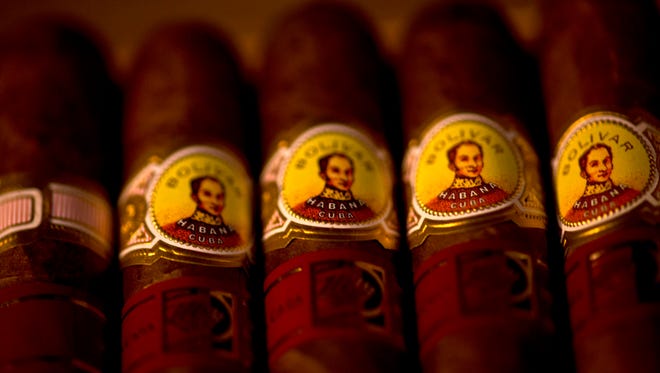 Samples of Cuban Bolivar cigars sit on display at a shop in Havana on Dec. 19, 2014.