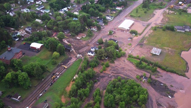 Aerial images show flooding damage to Houghton County taken from a Michigan State Police helicopter on Monday, June 18, 2018.