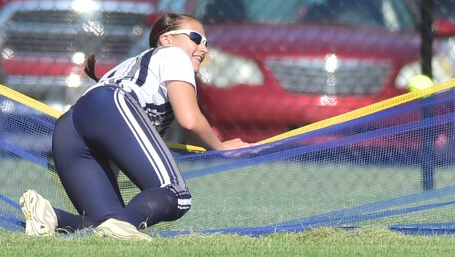 Chambersburg's Taylor Myers chases a homerun by Cumberland Valley's Katie Wingert over the fence. Chambersburg defeated Cumberland Valley 11-5 in a PIAA District 3 softball playoff game on Tuesday, May 23, 2018 at Norlo Park.