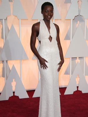 The thief who took Lupita Nyongo's pearl-encrusted Oscar dress returned it after learning the baubles were fake.